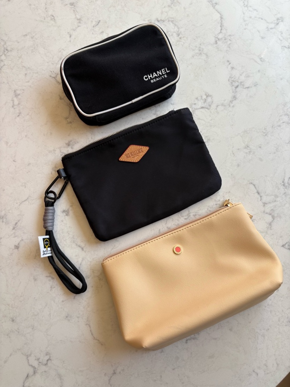 CHANEL Beauté Black Pouch + MZ Wallace black/yellow Bulgari Travel Pouches